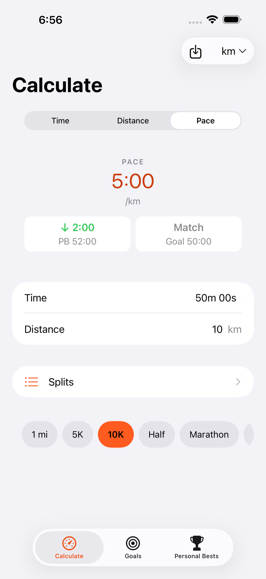 The PaceWise Calculate screen, solving for a 5:00 per kilometre pace from a 50-minute 10K goal, with split and personal-best comparisons.